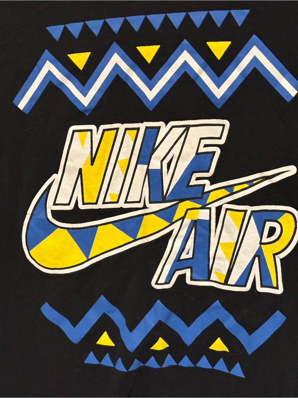 Nike Black kid’s Tee with Blue and Yellow Graphic